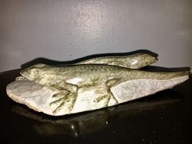 Salamanders carved from stone