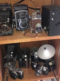 Vintage and Antique Cameras, many with original cases and manuals
