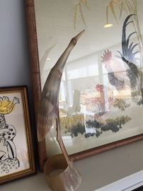 Pair of carved horn long legged birds