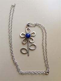 Love this sweet sterling flower with Lapis center
