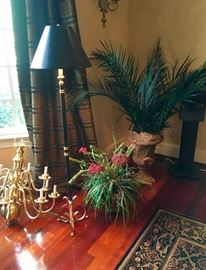 High end assortment of decorative items including a two tier chandelier.