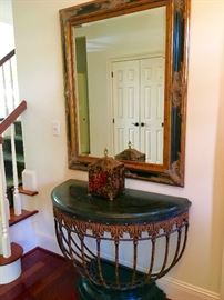 Substantial marble and iron table and large decorative mirror