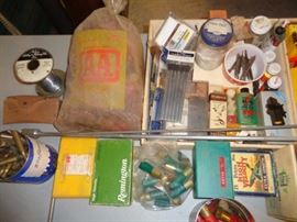 Rifle cleaning equipment. empty reloading shells.