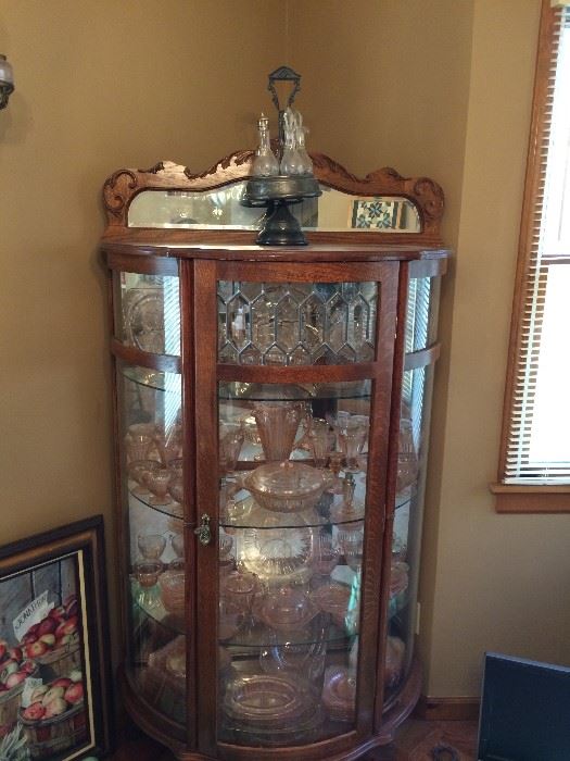  Oak vintage curio cabinet with beveled lead glass front 