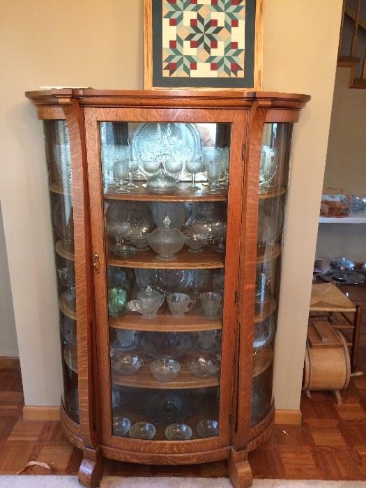 Oak manage a curio cabinet with bold glass front and sides