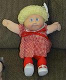 Original Cabbage Patch Doll with black signature and papers