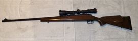 REMINGTON 700 ADL 7MM MAG BOLT ACTION CENTERFIRE RIFLE WITH SELF ADJUSTING LEUPOLD 3.5 X 9 X 40 SCOPE