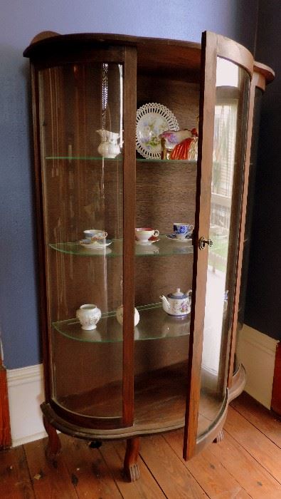 China Cabinet with Curved Glass Front, Cup and Saucer Collection
