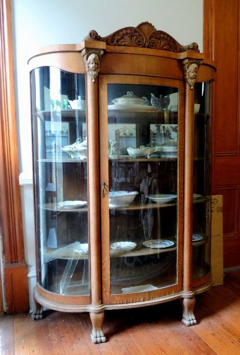 Ornate Carved China Cabinet with Curved Glass Front
