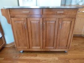 Kitchen island stainless steel top on castors