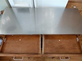 Kitchen island stainless steel top on castors