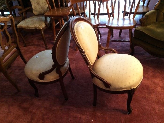 #45 (2) Bubble back cream color chairs on wheels $40 each
