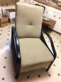 #40 Metal black chair with tan cushion seat $75
