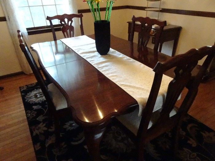 Table - 42"W X 62"L  + 1 15" leaf with 6 Chairs 