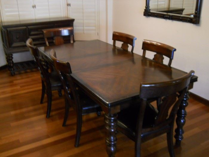 Legacy dining table with 6 chairs. Also has a matching side board