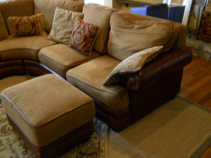 This sofa is L shape large leather trim with brass tacs also down filled Duck feather filled very comfortable