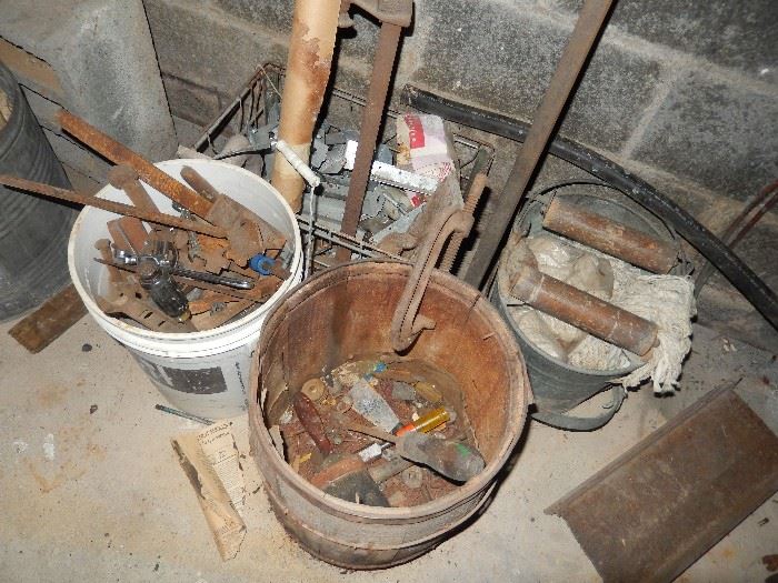 Buckets and containers of old tools