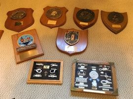 Military plaques, many decommissioned units, seaman knots