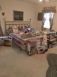 Brass King Size Bed With Various Boxed Items and Christmas Houses