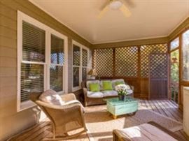 patio furiture: wicker couch, rocker, chair and ottoman (coffee table not for sale)