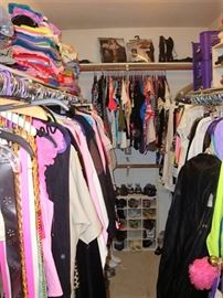 THIS IS "ONE" OF THREE CLOSETS - EACH FILLED WITH LADIES NICE CLOTHING, SOME IN WHICH STILL HAS THE TAGS. THERE ARE SOME DESIGNER LABELS AS WELL.