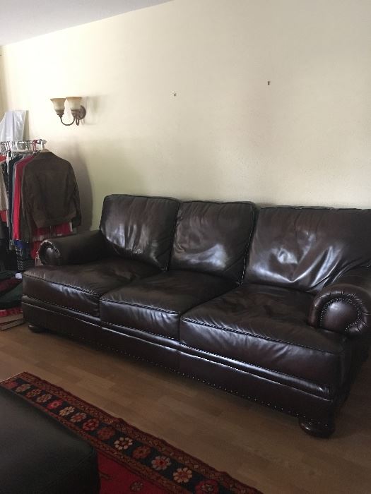 Hi End Leather Sofa and chair with ottoman, All 3 pieces are still under warranty...
