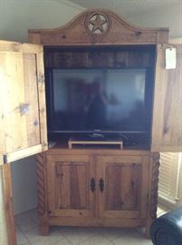 Rustic Texas star TV cabinet
