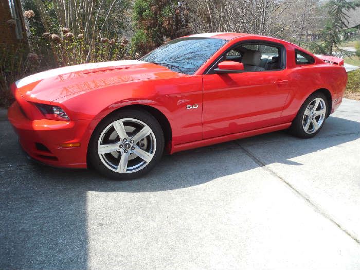 2014 Ford Mustang GT PREMIUM/One Owner/Garage Kept/25,800 miles like NEW. Rare combination of factory options: 6 speed, race red, white race stripe, spoiler. 19" five spoke wheels and two tone interior. Also has Steeda performance package: Axle-back exhaust, cold air induction and custom tune good for 470HP!!! A BEAUTY!!!!