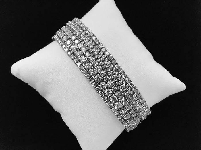 Tennis Bracelets from 2.50 to 14.50 Carat Total Weight.  $2800 to $16,500. Mountings 14 karat and 18 karat white and yellow gold. 