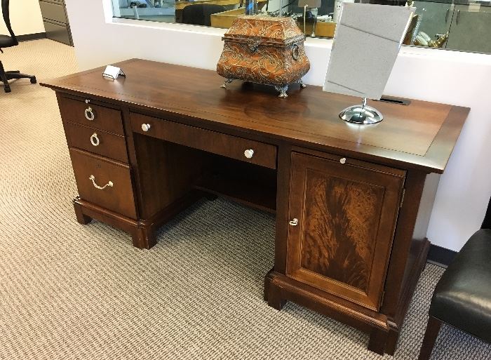 Executive desk by Stanley Furniture. 69" X 24". Computer keyboard and file drawer. Silver hardware. $300