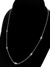 Marquise Diamonds by the Yard Necklace in White Gold. 10 diamonds weighing 2.30 carats. 32" long. $1200. 