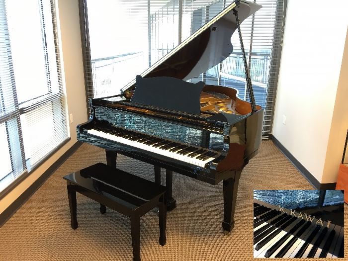 K. Kawai Ebony Black Baby Grand Piano and Bench. 5'. Piano has player system so you can enjoy even if you don't play. Good condition. $3500.