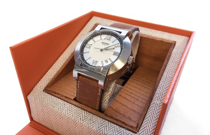 Hermes  Men's  Watch Nomade Compass Automatic Quart with leather band. Brushed steel. Roman figures. Dater. Compass is under watch. With box and papers. Near perfect condition. $700