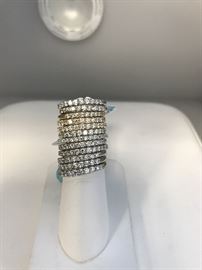 Stackable 1/2 carat wedding bands in 14karat white and yellow gold. $250 to $450.