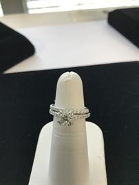 1.01 carat round brilliant cut diamond in engagement ring with matching wedding band. EGL certificate. Diamond is laser drilled.  $1250.