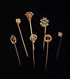 Antique gold stick pins. $75