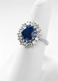 Sapphire ring with 14 diamonds equaling 1.49 carat total weight.  $860