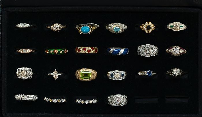 Assorted diamond and colored stone gold rings.
