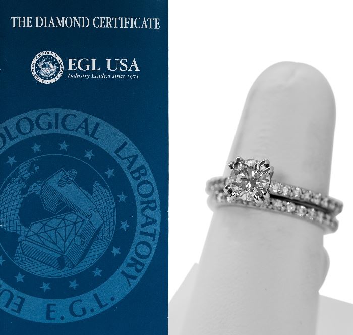 1.00 carat solitaire in 14kt gold ring with wedding band. EGL certificate.  $1200