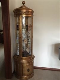 Gilded round curio cabinet