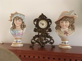Bisque busts and French mantle clock