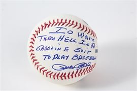 Pete Rose Autographed Baseball: A Pete Rose autographed baseball with acrylic case. It features Rose’s signature and the inscription “I’d Walk Thru Hell in a Gasoline Suit to Play Baseball” in blue pen on a Rawlings Official Major League Baseball. Includes a Classic Moments certificate of authenticity and an image of Rose signing the ball.