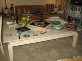Dining set converts to coffee table . Has two extensions and table protective pads