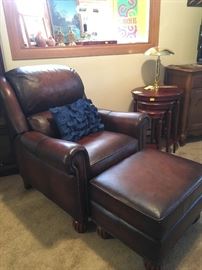 We have two of these nice leather chair and ottoman