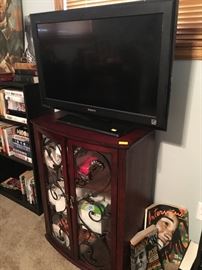 Third flat screen tv and nice cabinet