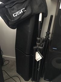 These QSC speakers, stands and storage bags look brand new!
