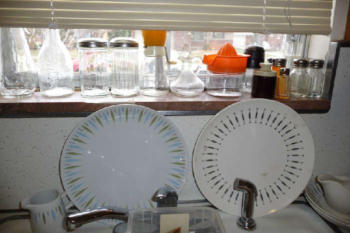 CLEAR KITCHENWARE ON SILL