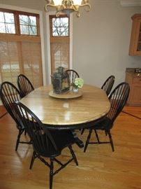Naked Furniture custom made dinning room table with 6 chairs and under table single leaf storage. $1250 OBO