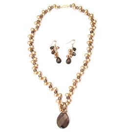 14K Gold Pearl and Brown Smoky Quartz Necklace with 10K Earrings: A 14K gold potato pearl and brown smoky quartz necklace with matching 10K earrings.
