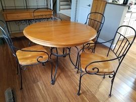 Kincaid Kitchen table and chairs. Metal base, wood seats and top.